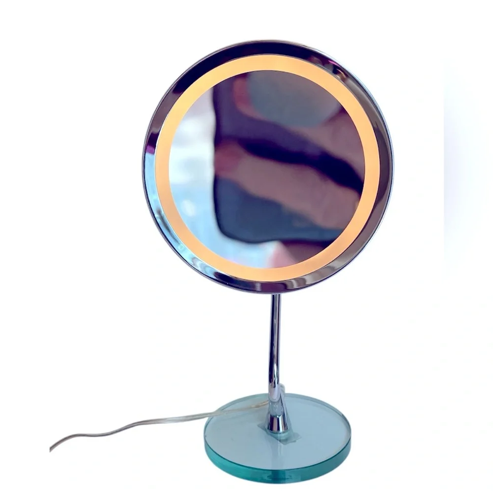 Silver Lighted Magnifying Stand Makeup Mirror on a Clear Lucite Base by HoMedics